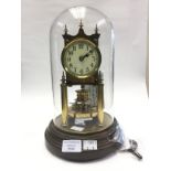 Gustav Becker glass domed, 400 day clock, serial number 2?65911, brass movement on base,