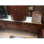 A mid 20th Century walnut veneered retro sideboard