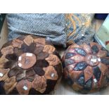 Two animal skin pouffe and two Batik pattern material floor cushions (4)
