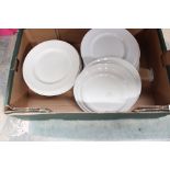 A large collection of assorted white porcelain ceramics, including T.