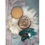 A cream 1920's ostrich feather cape; a pair of turquoise leather 1920 leather shoes with a t-bar,