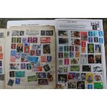 Five various albums of stamps to include two blue ring binders, loose leaf stamps,