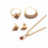 A collection of unmarked yellow metal items (tests as 9ct gold) to include a garnet pendant and