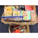 Two boxes of assorted games including the Action Man game, Monopoly, Meccano, various books, camera,