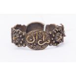 A turn of the Century unmarked decorative bangle, middle eastern,