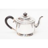 A George VI Walker and Hall sterling silver Art Deco teapot, Sheffield 1937, of cylindrical form,