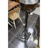 Floor standing metal oil lamp,