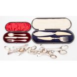 A late Victorian silver christening set comprising knife, fork & spoon Walker & Hall, Sheffield,