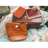 A leather medium sized case 1940's (sides damaged and handle broke);