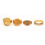 A collection of gents rings including two 9ct gold rings with a combined weight approx 5.