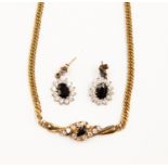 A 9ct gold necklace, set sapphire and CZ along with matching earrings, drop/butterfly fixings,