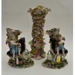 Pair of German spill vases with cherubs and grass flower decoration including Continental floral