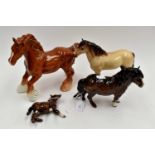 Collection of four Beswick horses Condition: Foal - Both rear legs re-attached Others - Good,