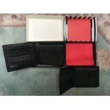 Two gentleman's designer black wallets,