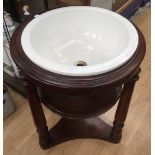 Victorian round sink with wooden stand