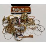 A collection of costume jewellery, comprising vintage paste set brooches, clip on earrings,