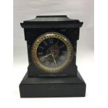 A 19th Century black slate and marble clock