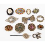 A collection of vintage and period brooches