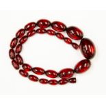 A cherry amber necklace (needs attention)