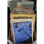 A collection of sheet music and song books,
