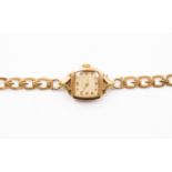 A ladies 9ct gold wristwatch, cushion shaped dial, approx 13mm,