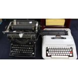 An American vintage Underwood standard typewriter with original cover together with a Scheidegger