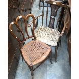 Victorian balloon back, rush seat, turned and splayed legs with another modern reproduction.
