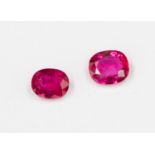Two loose cushion cut faceted rubies one weighing approx 0.