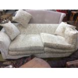 Two contemporary four seater cream settees