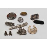 A collection of assorted Victorian jewellery, mostly silver brooches,