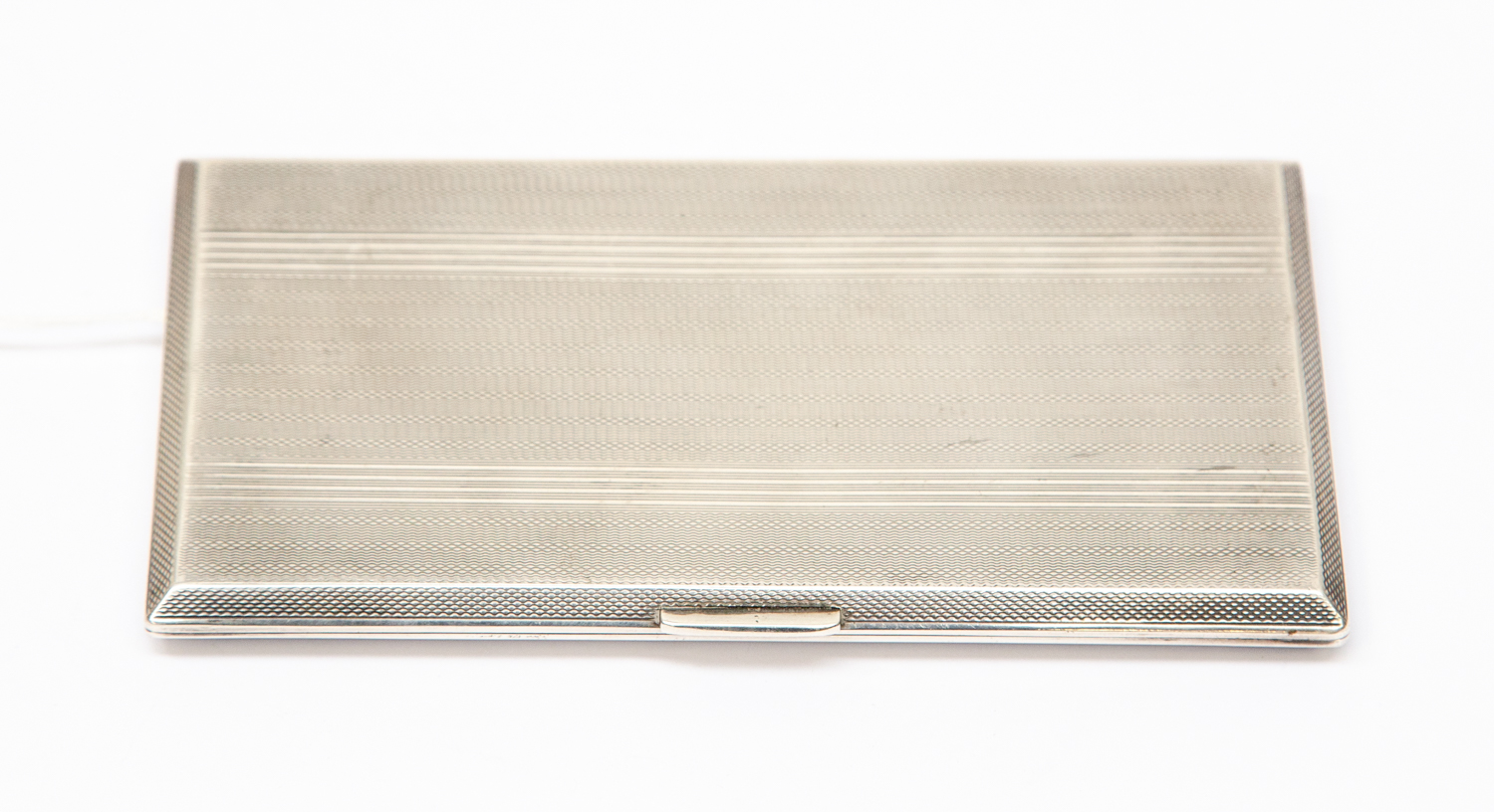 A Birmingham 1947 engraved and with engine turned decoration, cigarette case,