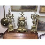 Jean a Rennes brass clock and a pair of candelabra (3)