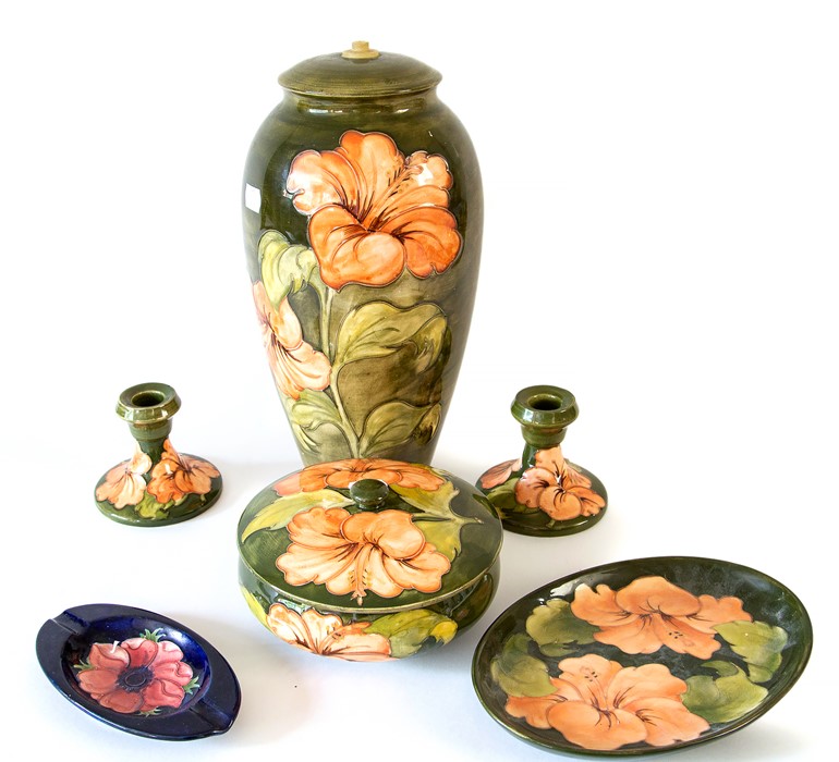 Collection of mid 20th century Moorcroft - candlesticks, lamp vase, lidded dish, ashtray and a pin