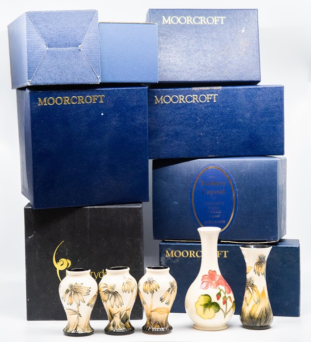 Three small Moorcroft vases (16cm, 12.5cm), two Moorcroft vases (10cm), group of empty Moorcroft