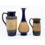 Royal Doulton vase (Ht 27cm), Royal Doulton jug (Ht 25cm) and Doulton Lambeth jug (Ht 17cm) (blue,