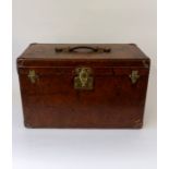 Louis Vuitton, an early 20th Century Louis Vuitton steamer trunk, tan leather with studded corner