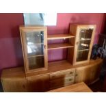 Ercol display cabinet with two side units.