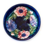 A Moorcroft anemone bowl, blue, W M monogram. Diameter 21cm