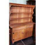 A Rupert Griffiths joined oak dresser and rack, in the Arts and Crafts manner, or traditional