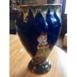 Crown Devon, Fieldings, England blue vase with castle, circa 1930s. Height 26cm