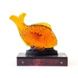 Amber glass fish ornament on faux turtle shell base. 32xm wide x 12cm deep x 26cm high Crack to