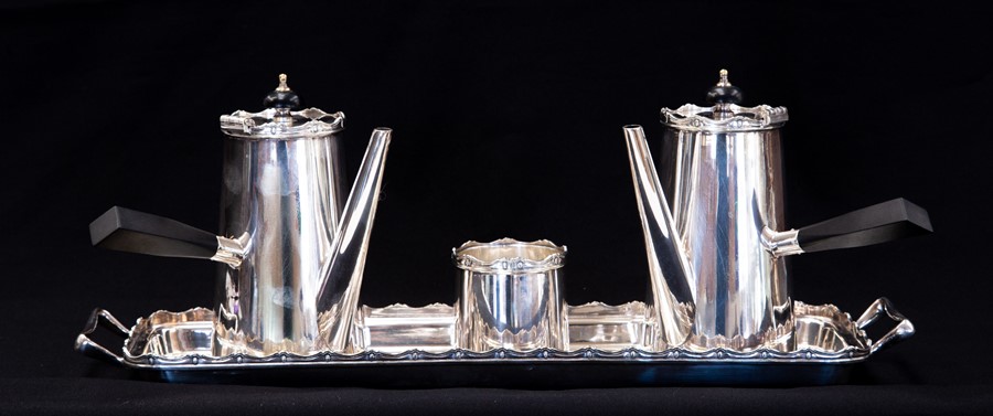 An Art Deco EPNS four piece Batchelor coffee set including coffee pot, milk pot, sugar bowl and