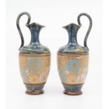 Pair of Royal Doulton jugs. Ht 29cm