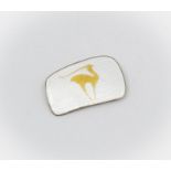 Finn Jensen, mid century silver gilt enamel Gazelle brooch, white background with gold tone Gazelle,