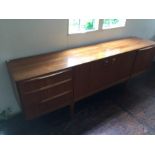 An A.H. McIntosh teak sideboard, circa 1970, designed by Tom Robertson and manufactured by A.H.