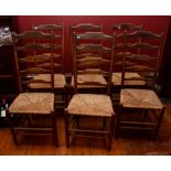 After Ernest Gimson, a set of six Arts and Crafts late 19th Century ash ladder back chairs, 115cm