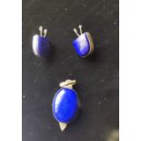 Lapis Lazuli pendant and earring set. Oval pendant with white metal mount, loop and decoration, with
