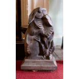 An Art Deco lead study of rabbits. Height 16cm