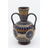 A Doulton Lambeth two handled vase, blue, brown. Impressed marks to base.Ht 20cm