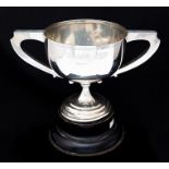 Angling: A hallmarked silver angling trophy, inscribed 'Towcester & District Angling Assoc Roach